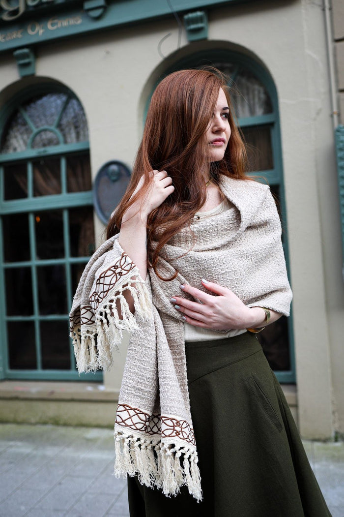 Natural cotton wrap for women with decorative fringe and woven Celtic embroidery border detail