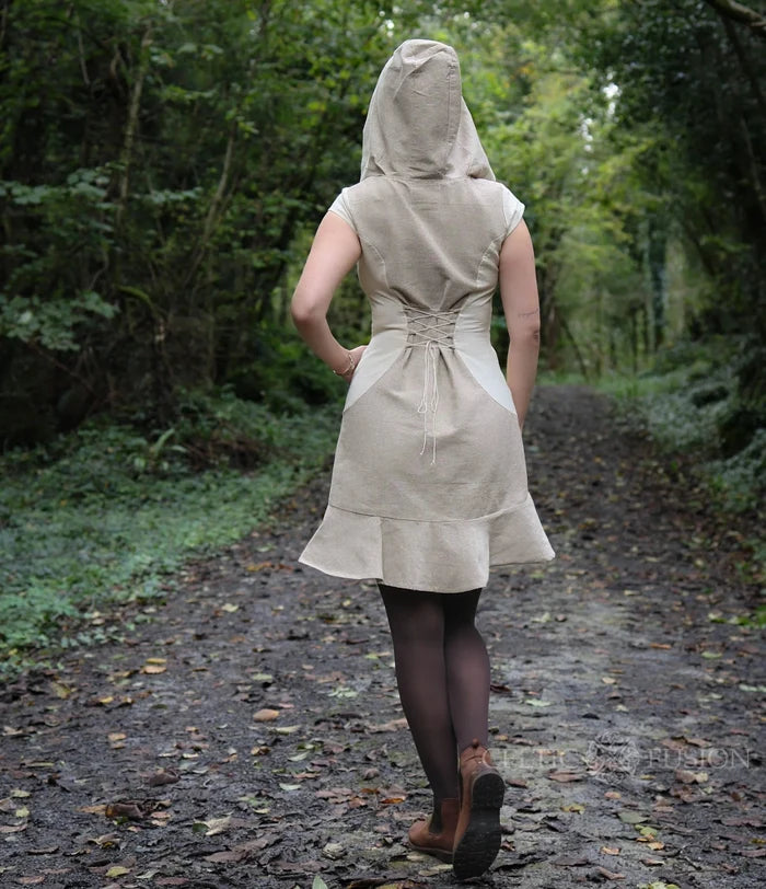 Beige hooded dress with adjustable corset lace-up back and softly flared ruffle hem.