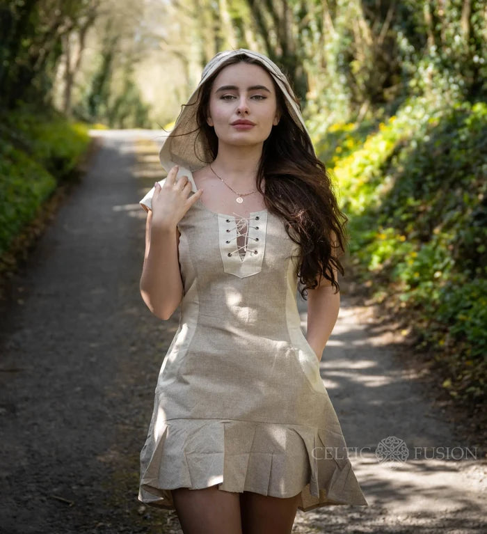 Natural cotton beige folklore dress with hood, lace-up neckline, fitted waist and flared hem.