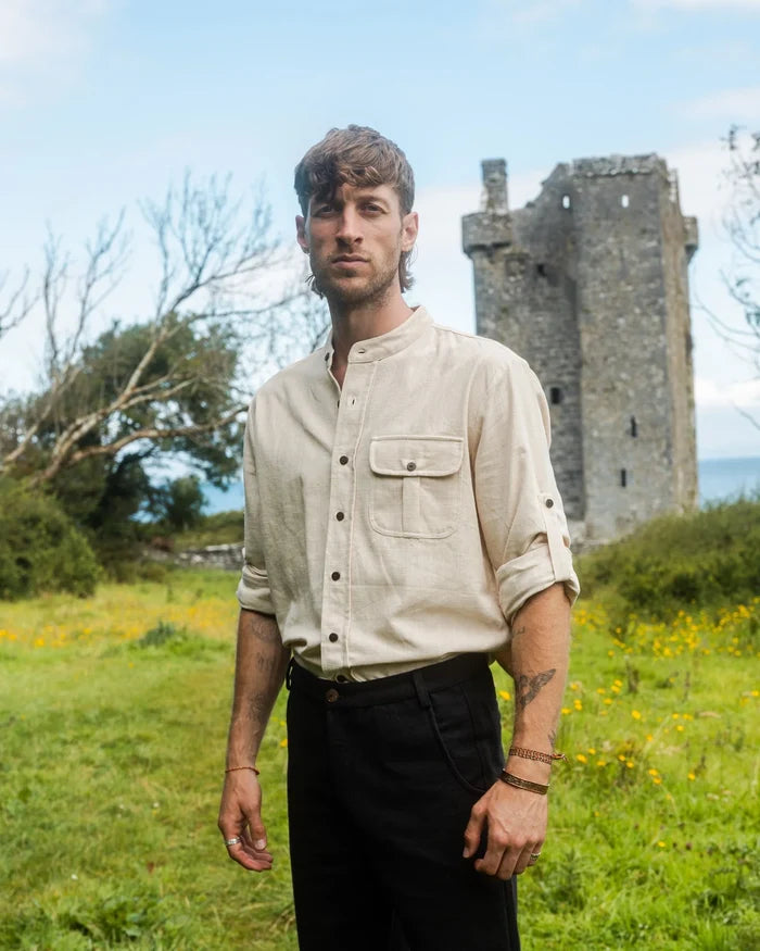 Celtic Shield Collarless Shirt in natural cotton slub, front view of an Irish shirt for men with wooden buttons and shoulder embroidery