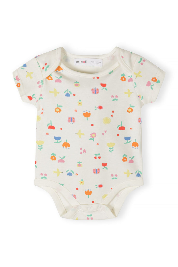 Girls short sleeve bodysuit with colorful floral print, front view.