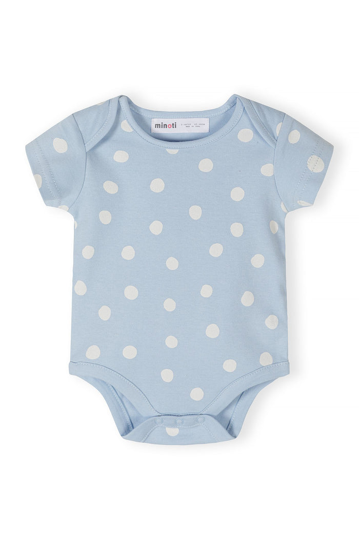 Light blue short sleeve bodysuit with white polka dots, close-up view.