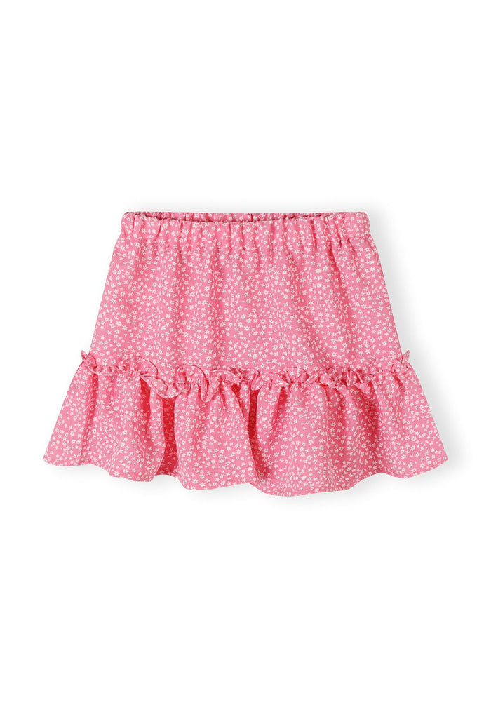 Girls pink skirt with crinkle layered pleats and frills, front view.
