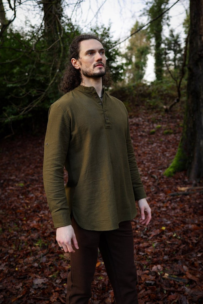 Men’s olive green collarless shirt with button front and relaxed tailored fit made from sustainable cotton fabric
