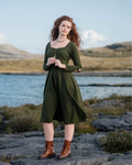 Imbas Corset Dress front view in dark green, a folklore midi dress with sleeves, square neckline and flowing skirt