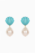A pair of drop earrings featuring turquoise blue scallop-shaped tops and large, lustrous cream pearl drops, set with small gold accents on a plain white background.