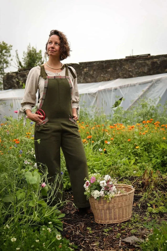 Folklore fashion garden dungarees styled with fresh flowers and practical front pockets