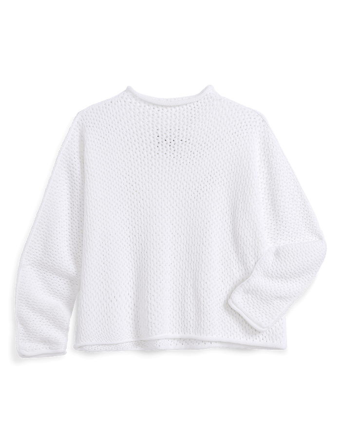 White textured sweater on a black background