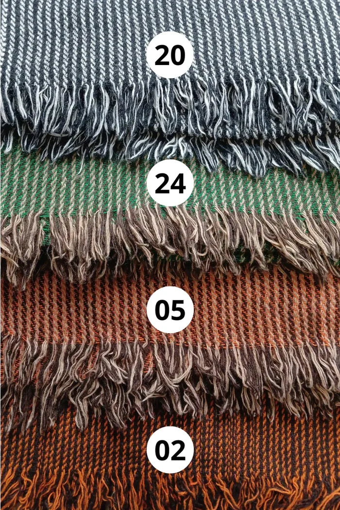 Handwoven shawl swatch options in grey, green and rust tones, showing striped wool blend weave and fringe detail by Celtic Fusion