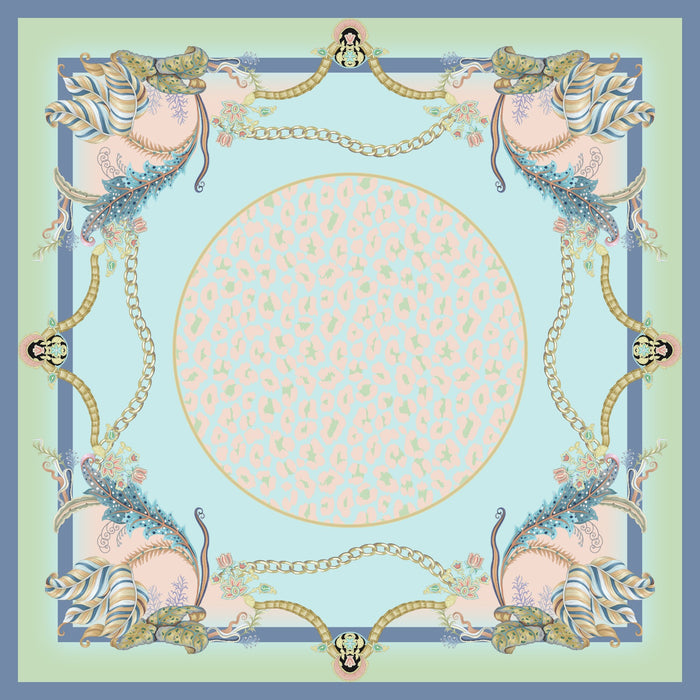 Premium Hamida silk scarf with soft blue, blush pink, and ivory tones, decorated with floral motifs and gold chain patterns.