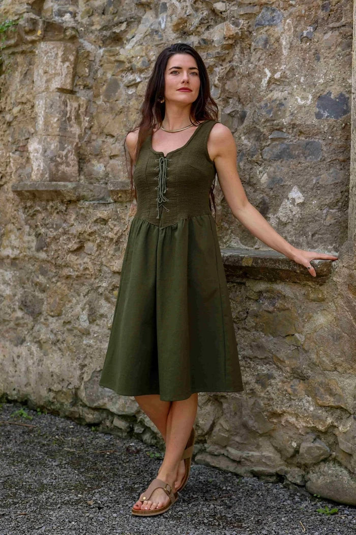 Dark green folklore dress with pockets. Sleeveless Green Corset Dress style, shown full length with a softly structured bodice
