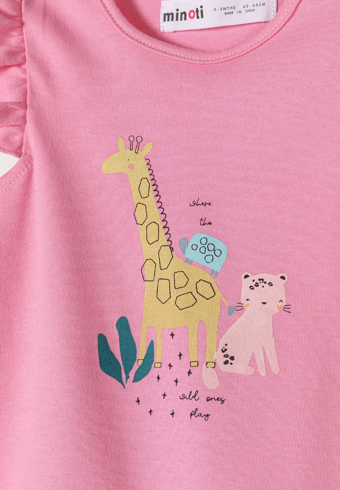 Detail of a pink romper with frill sleeves featuring a giraffe and a leopard graphic.