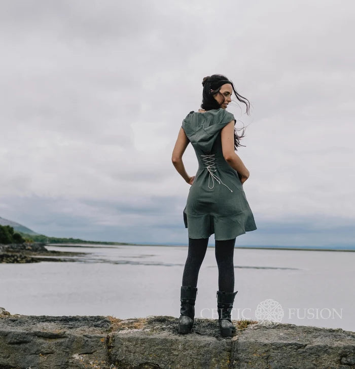 Natural cotton hooded folklore dress showing the adjustable corset lace-up back and flared mini hem.