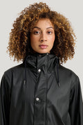 Timeless rain jacket made from recycled PU material.