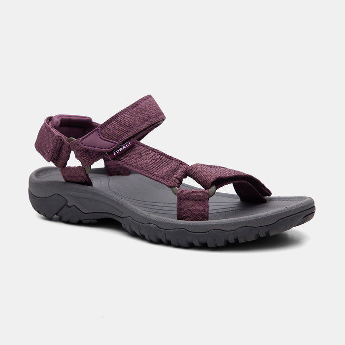 Purple sandal with gray sole on a white background